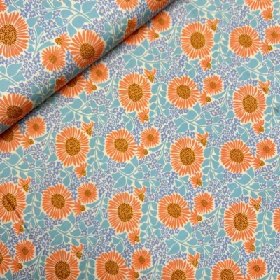 Baumwolljersey Retro Blumen Orange auf Hellblau