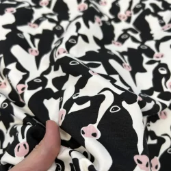 French Terry angeraut Kuhköpfe – Schwarz/Weiß