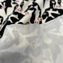 French Terry angeraut Kuhköpfe – Schwarz/Weiß