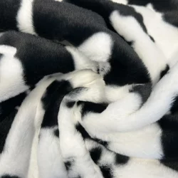 Kunstfell Kuhmuster – Weich, Stylisch & Vielseitig